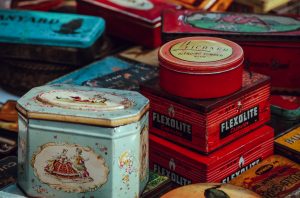 a variety of vintage tin canisters