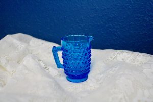 blue glass hobnail pitcher 