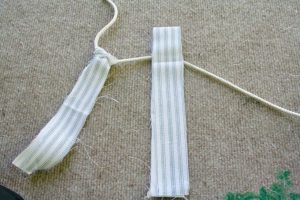 attaching fabric on rope for ticking stripe fabric garland