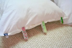 hold glue in place with clothespins on vintage pillowcase