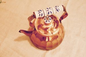 vintage copper teapot with ridges