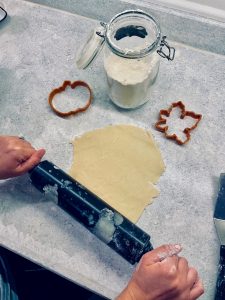 roll out cookie dough for sugar cookies