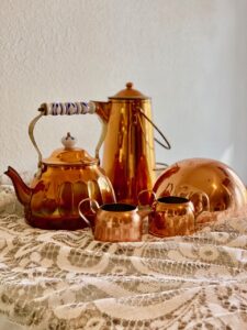 a collection of vintage copper