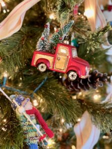 a vintage truck ornament on a Christmas tree