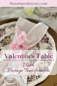 vintage transferware with a heart napkin styled on a Valentines table