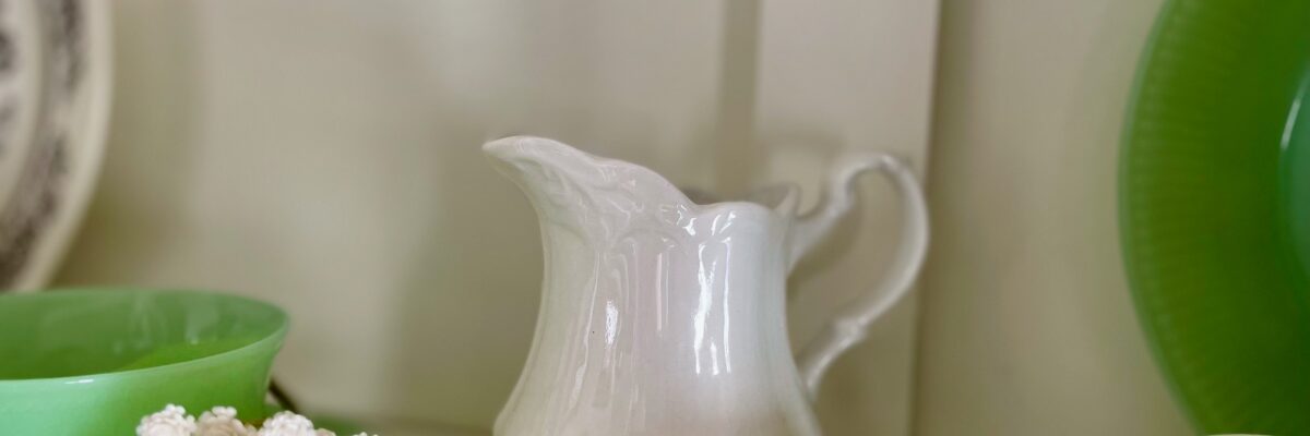 vintage Spring decor styled in a hutch