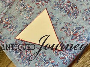 trace a triangle template onto fabric for bunting