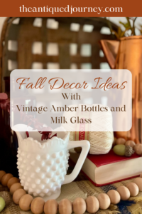 vintage amber bottles used with copper and milk glass for Fall decor