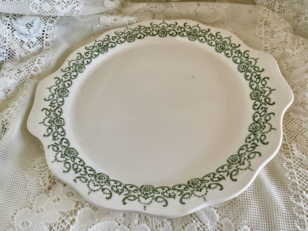 vintage green and white plate with handles