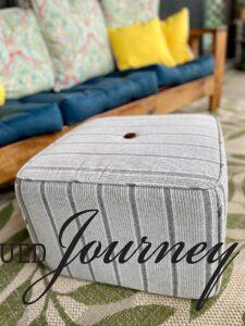 an outdoor pouf for extra seating