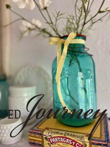 a vintage blue ball jar with faux stems for Summer