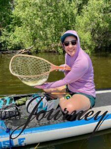 fly fishing on paddle board