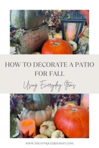 fall patio decor with pumpkins and faux pillar candles