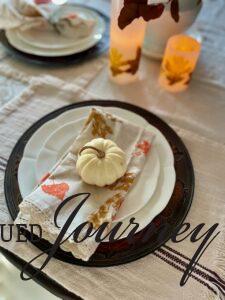 DIY leaf stamped napkins styled on a table setting