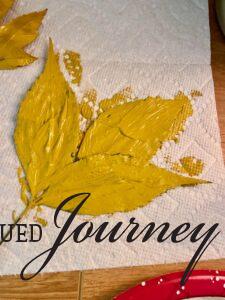 yellow ochre paint used on a leaf for stamping