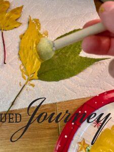 dob paint onto a fresh leaf for stamping