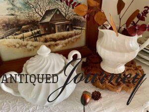 a thrifted set of ironstone cream and sugar dishes for a Thanksgiving table