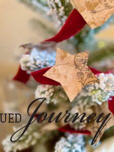 a DIY Christmas star garland using thrift store materials