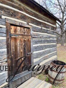 old log cabin in the woods around Thanksgiving time