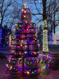 wine barrels in the shape of a Christmas tree at a winery