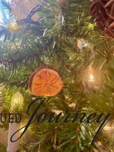 dried orange slices used as natural and budget decor on a Christmas tree