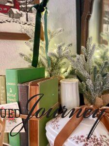 loads of greenery used on a mantel for Christmas decor