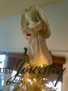 vintage angel tree topper on a vintage and minimally decorated Christmas tree