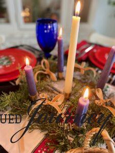 a lit Advent wreath for Christmas Day dinner