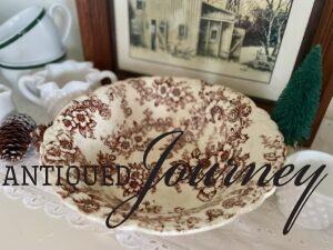 an antique brown transferware bowl found at the thrift store 