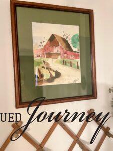 a vintage watercolor barn painting found at a thrift store