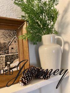 vintage decor mixed with natural elements for winter entryway styling