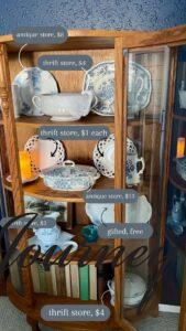a curio cabinet labeled with prices for each item inside