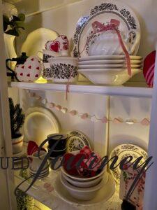 vintage decor elements for Valentine winter decor in a hutch