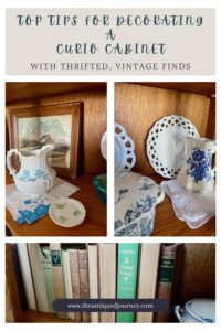 a thrifted antique wooden curio cabinet styled with vintage blue and white decor finds