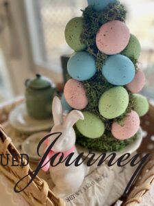 a DIY Easter egg topiary tree used for charming Spring decor