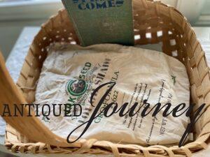 a seed bag used in an Easter decor vignette 