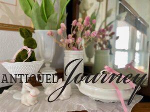 white bunnies used on a spring mantle display