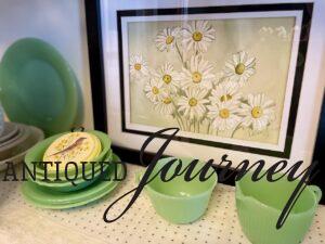 a collection of vintage jadeite styled in a hutch for Easter decor
