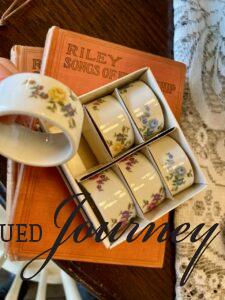 thrifted, vintage napkin rings with hand painted flowers