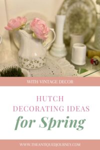 vintage ironstone and thrifted decor styled on a shelf for spring