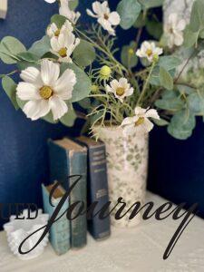vintage books used for Spring decorating in a bedroom
