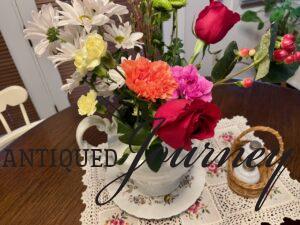 birthday flowers in an ironstone vase