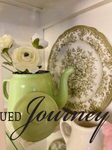 vintage enamelware with faux flowers for Spring shelf decor