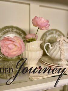 vintage ironstone dishes styled for living room hutch decor