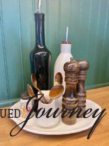 kitchen items corralled on an ironstone platter 