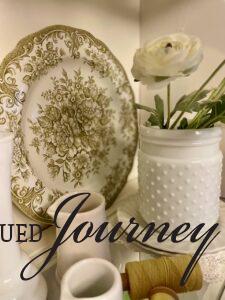 vintage dishes and other decorative accessories in Spring shelf decor