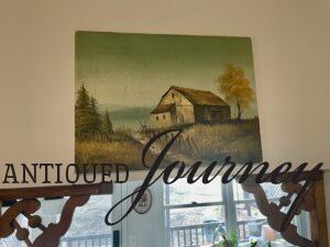 vintage art hanging in a small kitchen space unique kitchen decor ideas