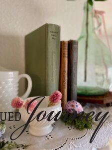 vintage milk glass styled on shelf. how to decorate a home in April!