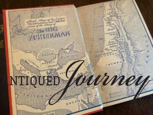 a vintage book with a map inside for simple vintage decorating ideas