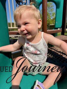 Molly sliding at the park